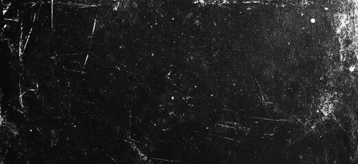 Black grunge paper texture background. Scratched black background 
