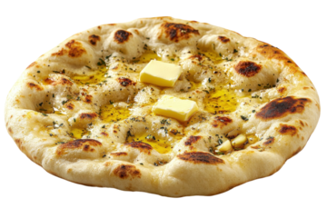 Freshly baked naan with butter and garlic oil served on a wooden table