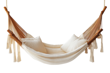 Cozy hammock with soft pillows suspended indoors, perfect for relaxation and leisure time