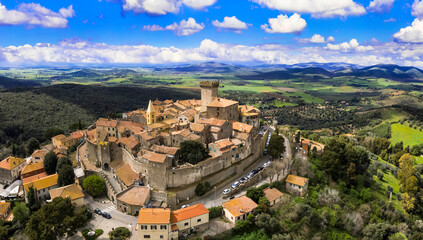 Italy travel and landmarks. Capalbio - charming small traditional hill top village (borgo) in Tuscany. Grosetto province. considered one of the most beautiful villages of Italy. aerial panoramic view © Freesurf