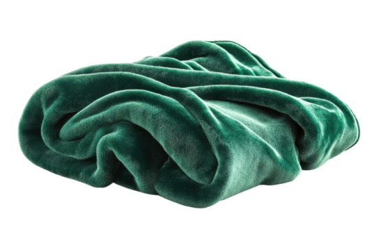 Soft green blanket carefully draped in a cozy living room setting during a cold evening