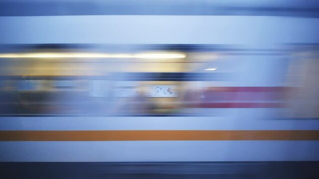 High speed train passing by, creating motion blur