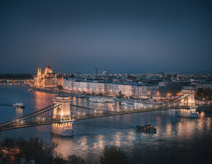 Famous Chain Bridge and the Hungarian Parliament in dusk