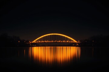 Naklejka premium Night view of arafed bridge illuminated, reflecting lights on serene water surface.
