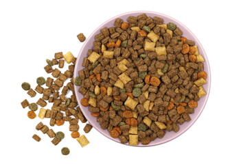 Pile dry colorful cat food in bowl isolated on white background, top view	