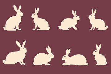 Set of Various silhouettes of rabbits on dark background
