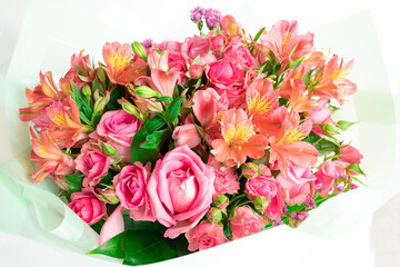 Beautiful bouquet of pink roses and alstroemeria arranged elegantly for a special occasion