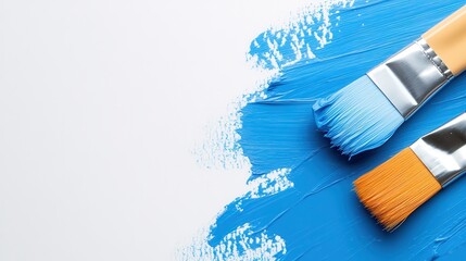Vibrant blue strokes and paintbrushes create an abstract artistic backdrop