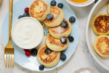 Cheese pancakes with yogurt and berries..style hugge