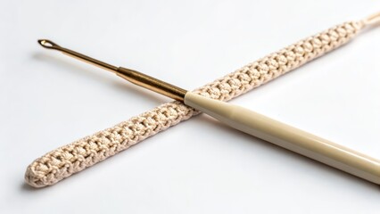 Crochet Hook and Yarn on White Background