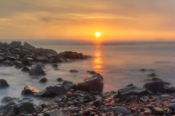 Sunset at breakwater in Dolphins Beach, Miraflores District - Lima, Peru