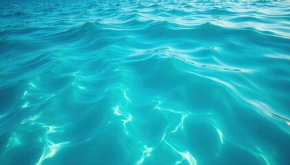Fototapeta premium Calm blue turquoise water in the ocean with foamy waves and ripples on sea surface, marine, turquoise