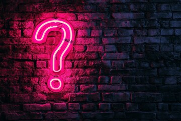 Neon Question Mark on Brick Wall at Night