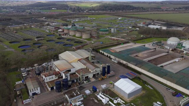 Aerial view of industrial warehouses and units business park factories industrial revolution in the east midlands UK. quantum computing era.