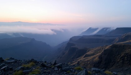 Serene Mountain Landscape at Dawn with Mist and Soft Light