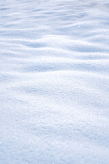 natural Snowdrift in sunny day. Nature Winter snow texture background.