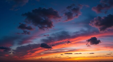 Obraz premium Fiery sunset cloudscape dramatic vibrant colors. AI Generated