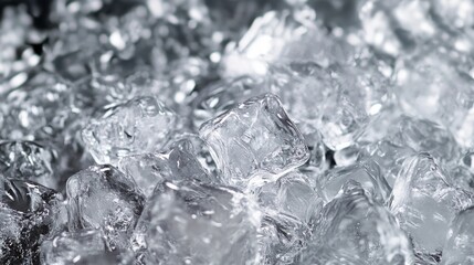 Melting ice cubes on blue and black backgrounds
