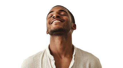 Joyful man smiling with eyes closed, conveying happiness and positivity, isolated on white background.