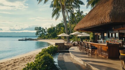 Fototapeta premium Beachfront bar table positioned near the shore with a relaxed tropical vibe.