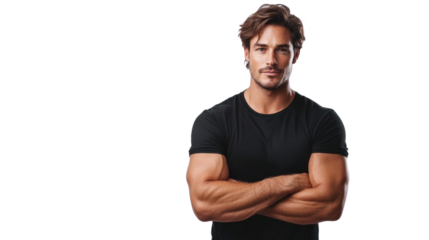 Confident man with muscular arms poses with crossed arms, wearing a black t-shirt, on a white isolated background.