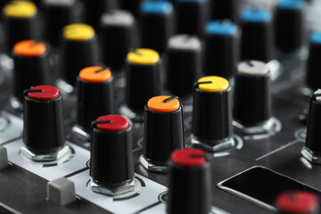 Professional mixing console, closeup. Radio studio equipment