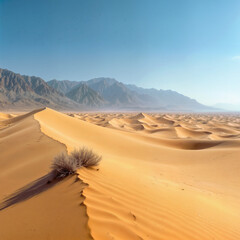 Endless Sand Dunes in Desert Landscape with Mountain Backdrop
