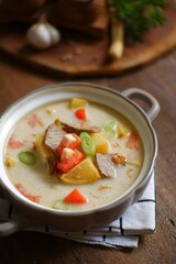 A bowl of soto Betawi 