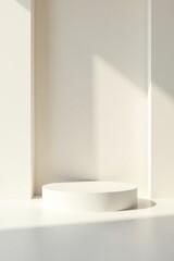 A minimalist white cylindrical platform bathed in soft sunlight against a clean, off-white backdrop, ideal for showcasing products or designs