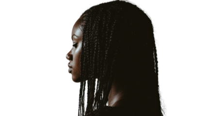 Profile view of a woman with braided hair against a white background.
