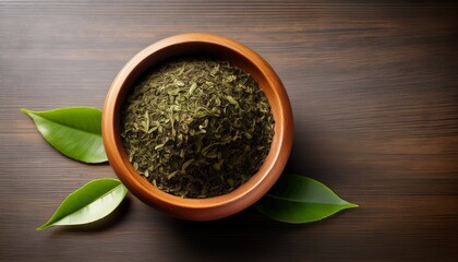 tea leaves in a bowl with natural textures and space for custom text ideal for tea related content and product promotion