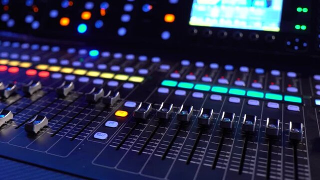 Black audio mixer with screen and buttons