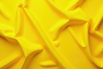 Yellow silk with subtle creases in a textured background, yellow, texture,