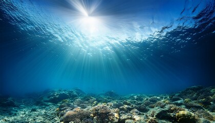 Obraz premium sunbeams and sea deep or ocean underwater as a background