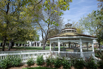Afternoon sun shines in the beautiful central park of downtown Brentwood, California USA, a city in...