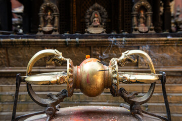 A Golden Vajra the symbol of Indra weapon (Kings of god in Hindu and Buddhism religion) in the golden temple of Patan, Lalitpur city in Nepal.
