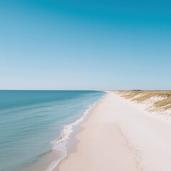 Obraz premium Serene coastline with untouched sand and bright skies