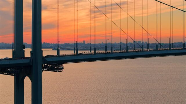 Sunset aerial telephoto focal 4K60p footage at White Stone bridge in New York City, NY