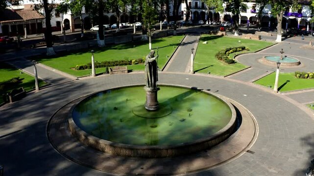 DRONE ORBIT SHOT OF DOWN TOWN PLAZA IN PATZCUARO MICHOACAN