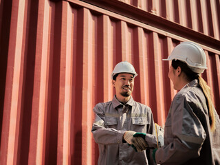 Engineer holding hands, Two Engineer  are agreeing on work .