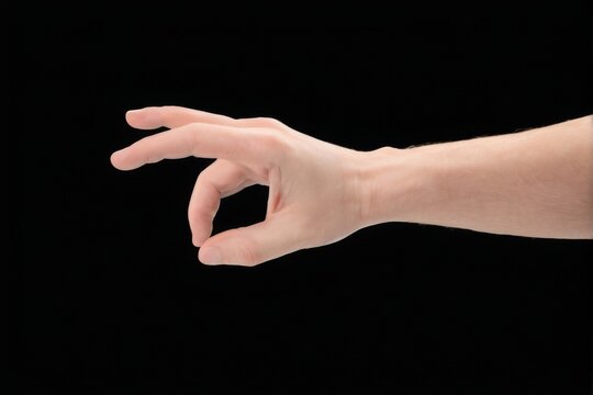 Closeup of a hand with fingers slightly spread apart, thumb and index finger pointing up, against a black background.