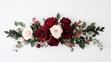 A beautiful arrangement of red and white roses with greenery, perfect for decoration or special occasions, showcasing elegance and charm.