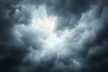 Obraz premium Dramatic dark clouds with hint of light peeking through