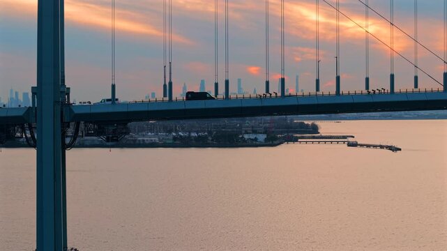 Sunset aerial telephoto focal 4K60p footage at White Stone bridge in New York City, NY