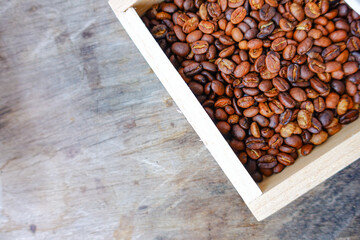 Close-Up of Roasted Coffee Beans in Wooden Box