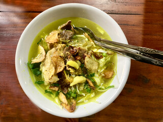 A bowl of Nasi Soto, a special Yogyakarta favorite chicken soup with rice for breakfast