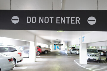 Do Not Enter sign in a parking garage. One way traffic only.