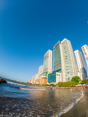 Fototapeta premium Vibrant Beachfront View of Cartagena's Modern Skyline in Bolivar, Colombia