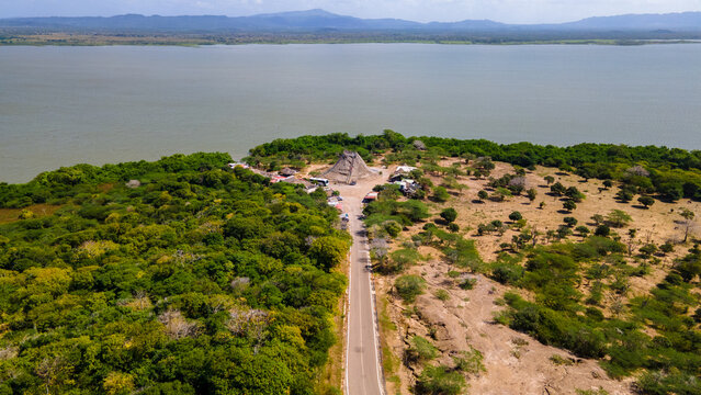 Aerial View of Totumo Volcano Surrounded by Lush Greenery and Water in Cartagena, Bolivar, Colombia