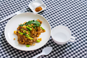 Stir fried soy sause noodles with pork